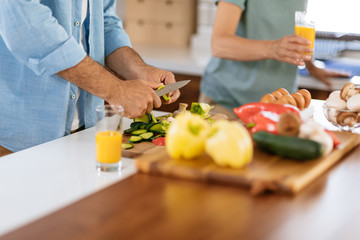 Cooking together in the heart of their home