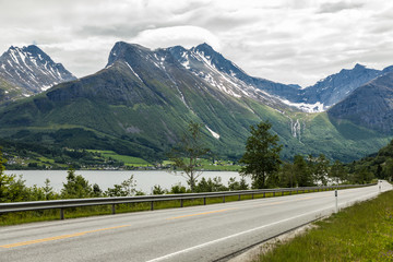 Fototapeta premium Scenic country road and beautiful mountains in Norway