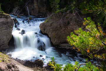 firehole river and waterfalls in yellowstone wyoming