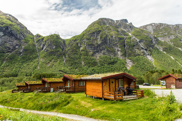 Fototapeta na wymiar Traditional norwegian red wooden house in Norway.