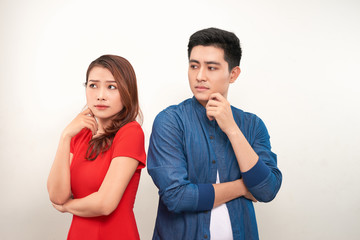 Fototapeta premium Young angry couple in love standing back to back