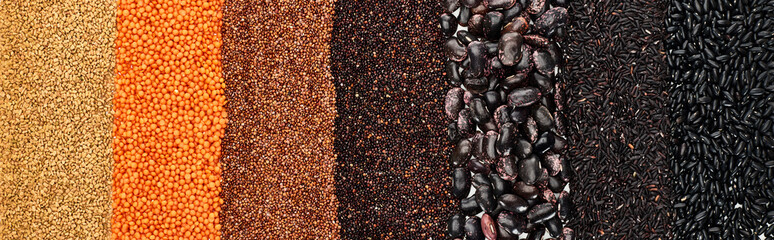 panoramic shot of assorted black beans, rice, quinoa, red lentil and buckwheat