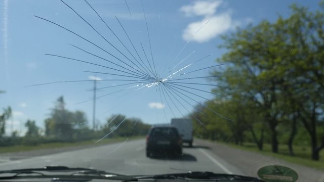 tore in windshield