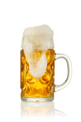 Big traditional glass of Bavarian beer isolated on white