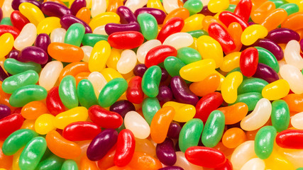 Colorful jelly beans isolated on white.