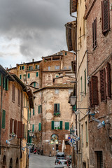 Fototapeta premium Old Colorful Buildings in Siena Italy