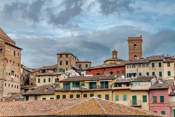 Fototapeta na wymiar Old Colorful Buildings in Siena Italy