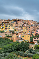 Fototapeta na wymiar Colorful Buildings in Siena Italy with dark cloudy sky