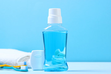 mouthwash on the table. Products to maintain oral cleanliness.