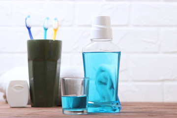 mouthwash on the table. Products to maintain oral cleanliness.