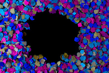 Background with confetti of different colors with the black center.