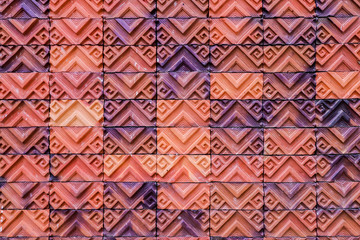 Close up of brick wall of brown and purple color