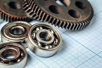 Car parts on graph paper for car engineering