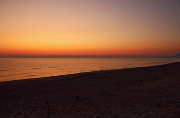  Orange sunrise on the beach