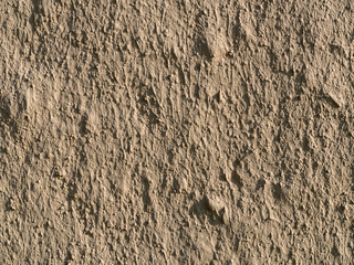 texture of a clay wall form a mud house