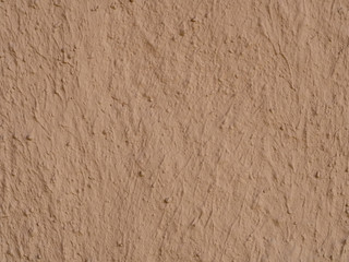 texture of a clay wall form a mud house