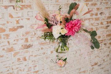 Coziness and style. Modern event design. Lounge zone and european traditional wedding ceremony decoration outdoors in the restaurant before the reception.