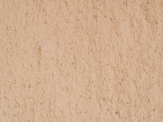 texture of a clay wall form a mud house