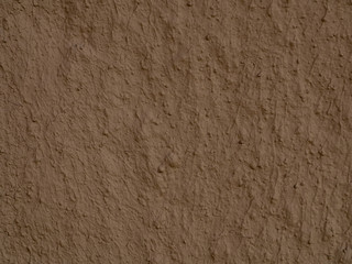 texture of a clay wall form a mud house
