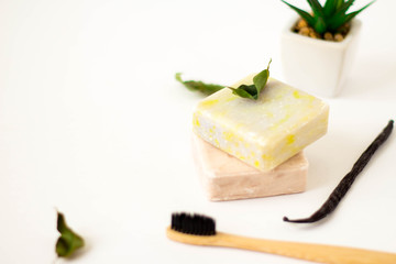 natural eco bamboo toothbrush, coconut and vanilla soap, vanilla,handmade detergent, bathroom essentials in sustainable lifestyle.