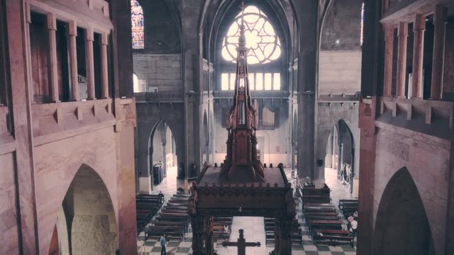 Nave of the cathedral of Manizales view from the balcony when the light enters from the stained glass. 4k
