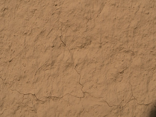 texture of a clay wall form a mud house