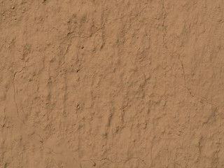 texture of a clay wall form a mud house