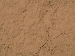 texture of a clay wall form a mud house