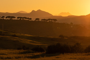 Obraz premium Sunset with mountains around AMAZING Ronda village, SPAIN