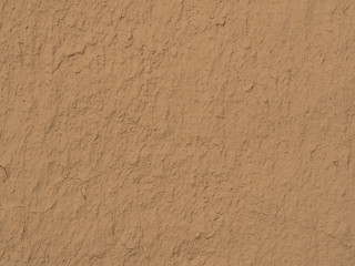 texture of a clay wall form a mud house