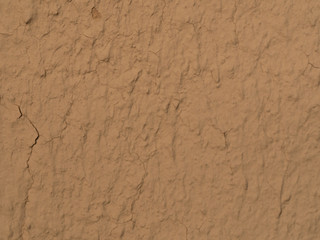 texture of a clay wall form a mud house