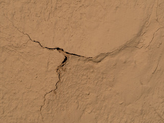 texture of a clay wall form a mud house