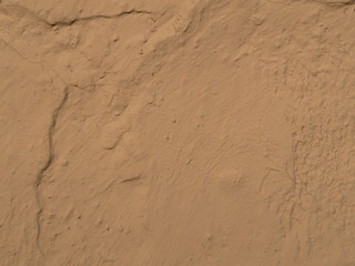 texture of a clay wall form a mud house
