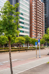 Obraz premium TAIPEI, TAIWAN - July 2, 2019: Street view of Modern architecture in Taipei, Taiwan