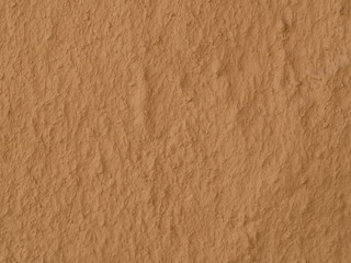 texture of a clay wall form a mud house