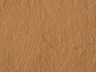 texture of a clay wall form a mud house