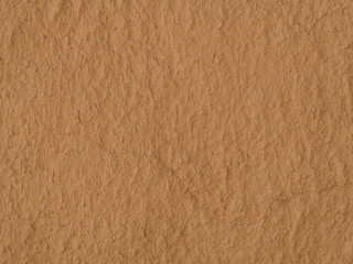 texture of a clay wall form a mud house