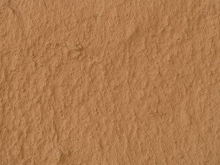 texture of a clay wall form a mud house