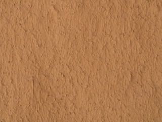 texture of a clay wall form a mud house