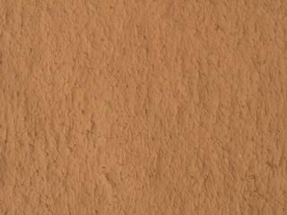 texture of a clay wall form a mud house