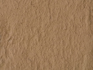 texture of a clay wall form a mud house