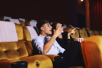 man watching movie at cinema