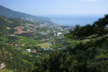 Fototapeta na wymiar Panorama of the city of Yalta. In the background is the Black Sea.