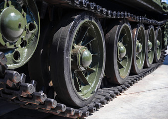 tank caterpillar, iron wheels, tank undercarriage close up, metal wheels close up, tank wheels