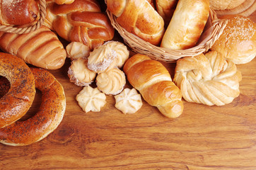 Assortment of baked goods on a wooden table
