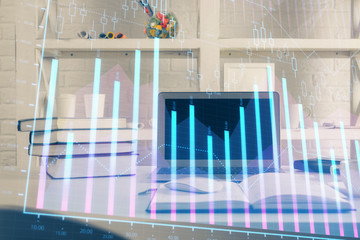 Stock market chart hologram drawn on personal computer background. Multi exposure. Concept of investment.