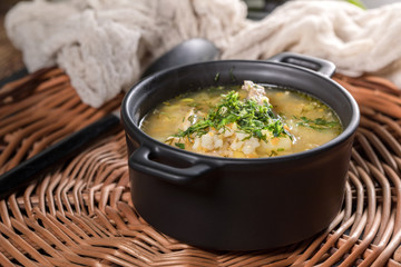 Barley soup with vegetables and chicken.