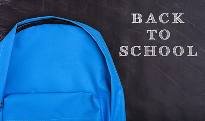 Naklejka premium Back to school shopping pocket backpack on the education blue bag