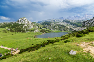 Covadonga, Spain. Tourists in Nature Reserve on the shores of Lake Ercina