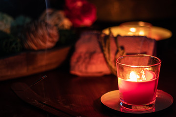 Spa elements with candles, incense, towel and a climate of tranquility